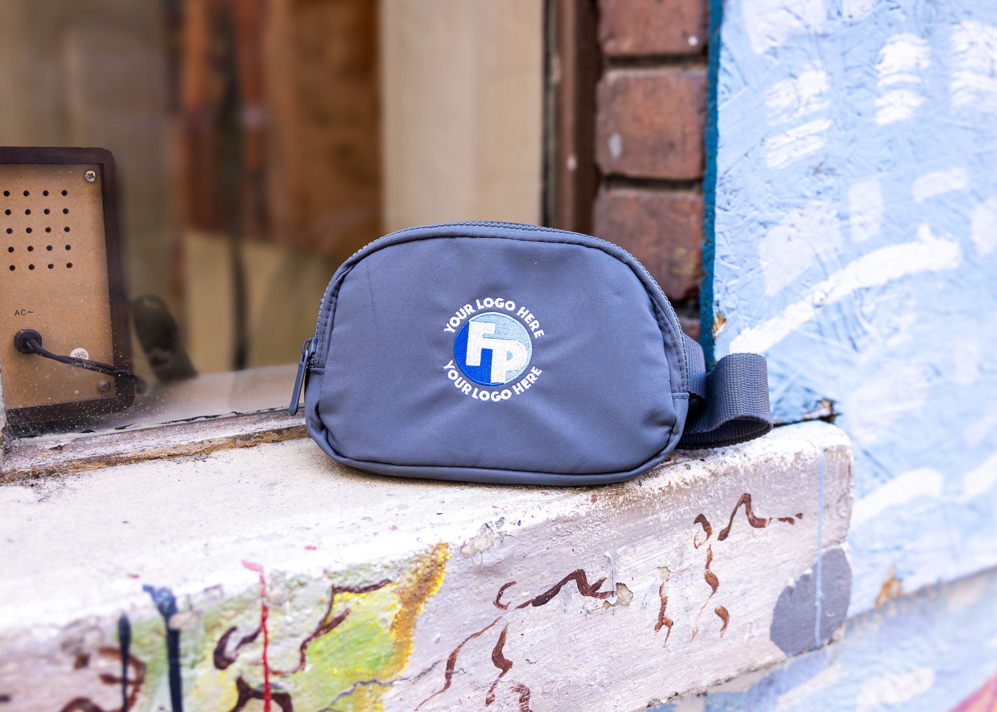 Embroidered branded pouch with custom logo placement, a Fully Promoted promotional product
