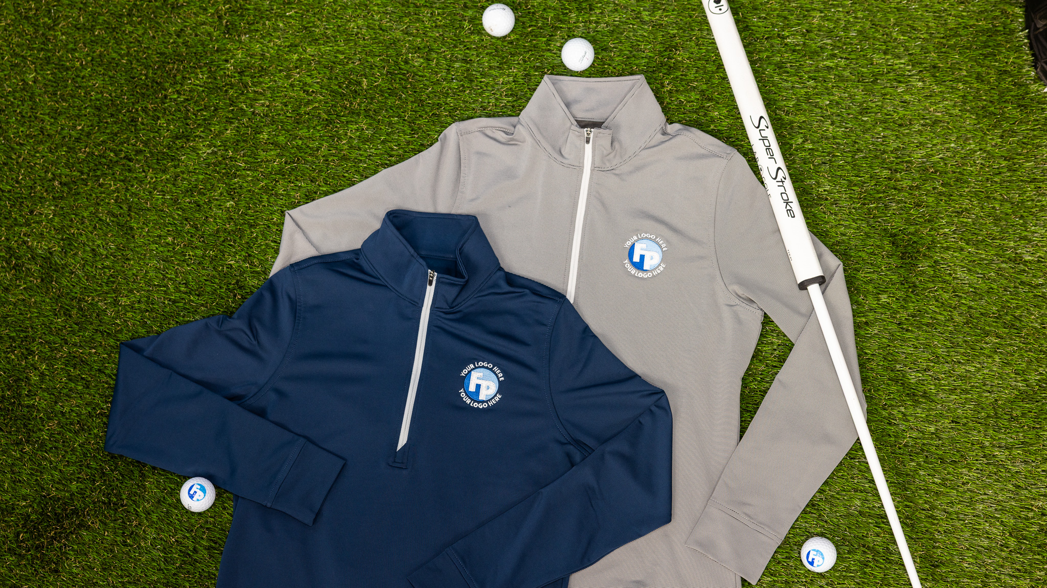 Fully Promoted branded quarter-zip pullovers with custom embroidered logo and promotional golf balls